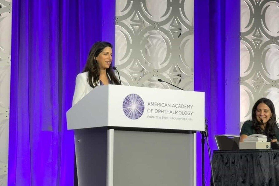 At the podium, American Academy of Ophthalmology