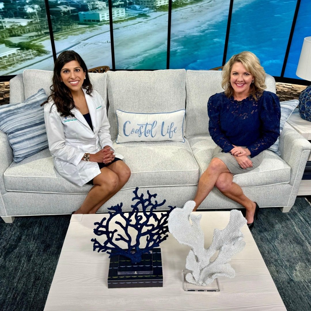 Dr. Priya Mathews on a TV set